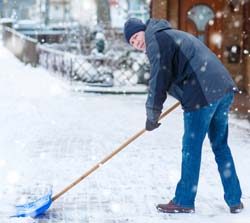 A man shoveling snow